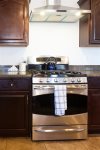 Full size kitchen w/ stainless steel appliances